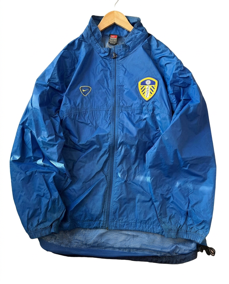 Size L — Vintage Nike Leeds United Windbreaker Jacket Blue Y2K Football Soccer